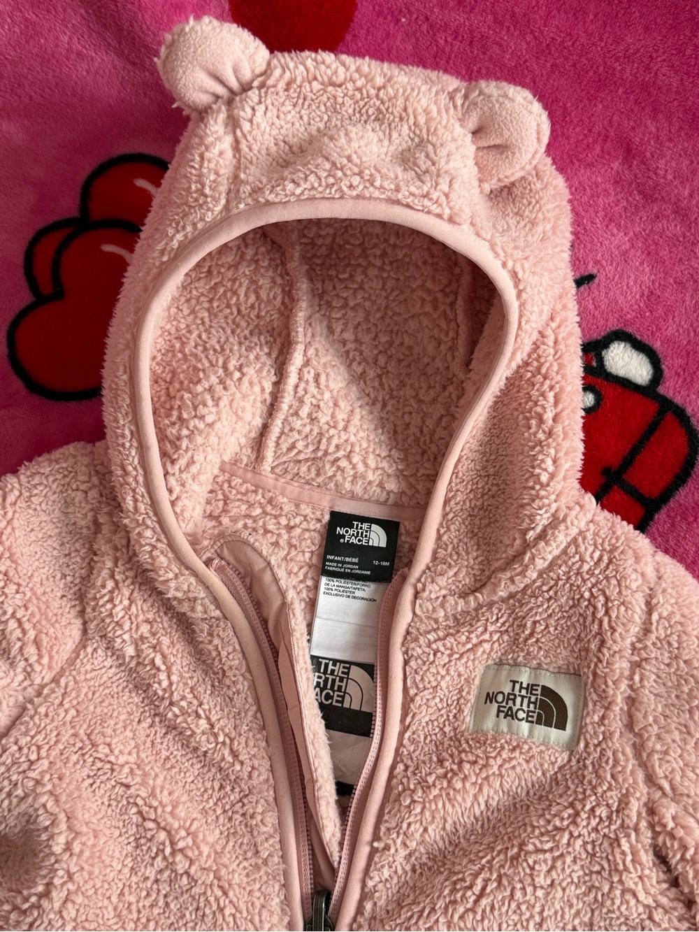 The North Face Kids Pink Sherpa Bear one piece